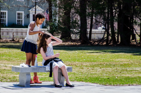 Naomi helps Rivka with her hair.